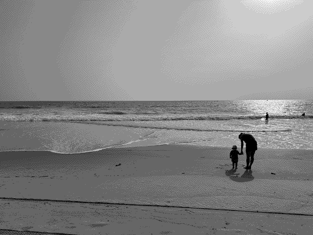 On the beach at sunset in Goa.