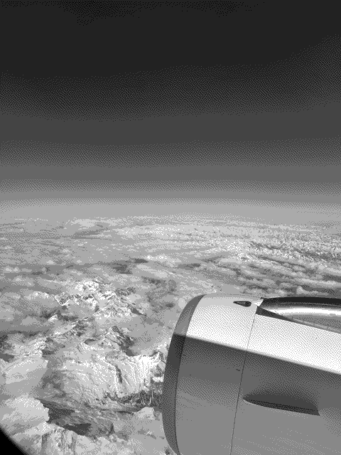 Our flight plan had us hopping over the Alps on our way to Rome