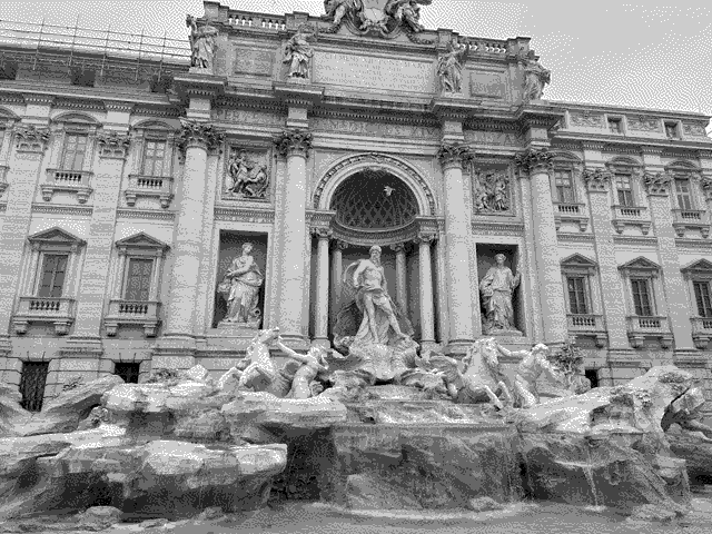 Fontana di Trevi, only visible briefly before 8 AM after which it is consumed by a mass of human bodies.