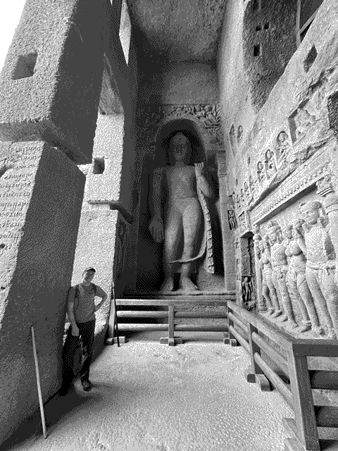 Buddha at the entrance. Me for scale.