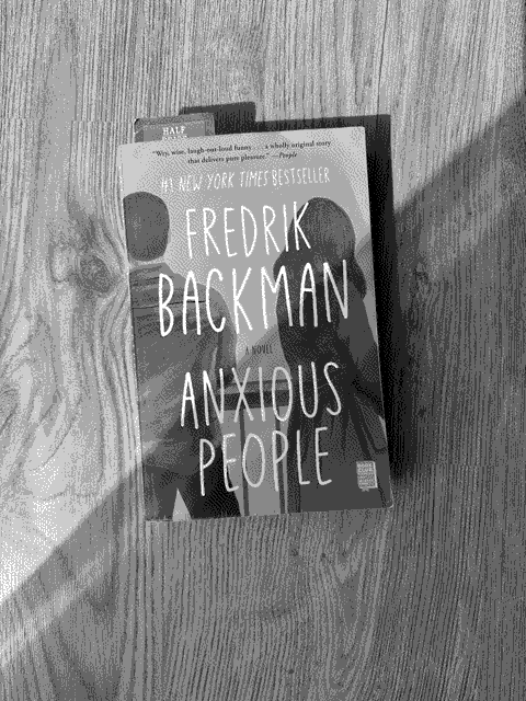 a picture of 'Anxious People' by Fredrik Backman in situ.